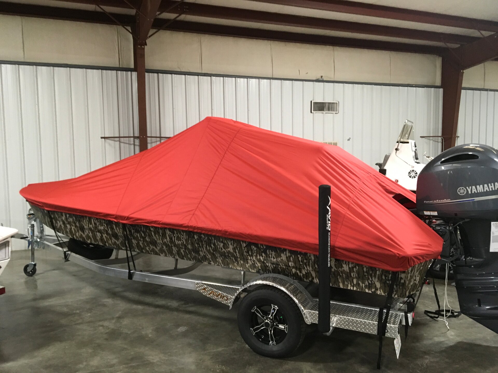 Custom-fit cover installed on Avid 21 FS Outboard