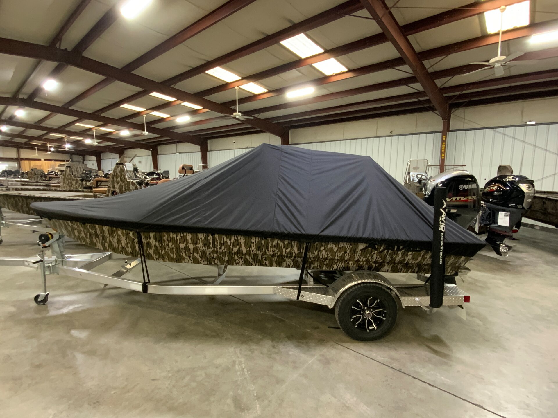 Custom-fit cover installed on Avid 19 FSX CC Outboard