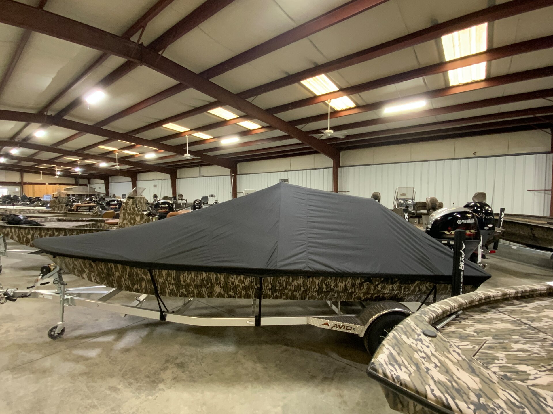 Custom-fit cover installed on Avid 21 FSX CC Outboard