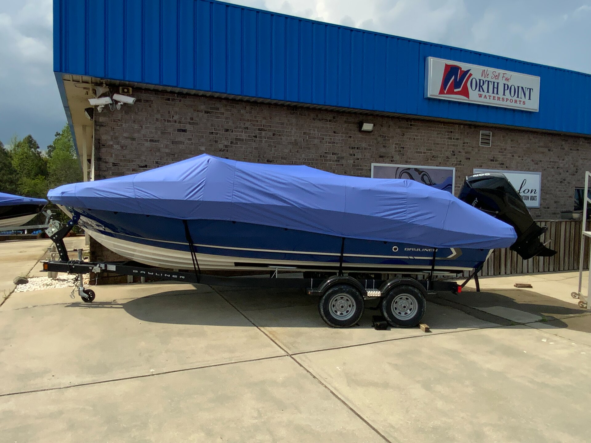 Custom-fit cover installed on Bayliner VR6 BR Outboard