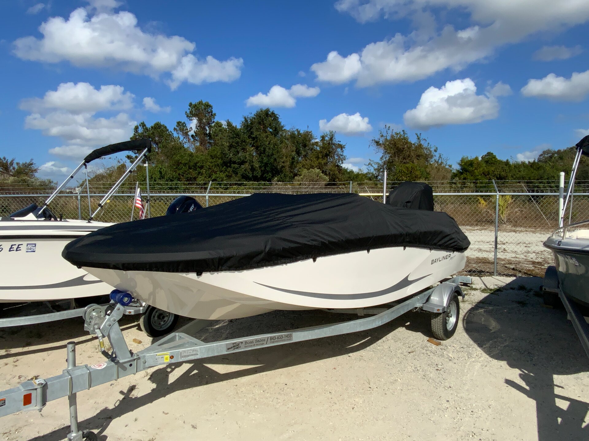 Custom-fit cover installed on Bayliner M17 SC Outboard