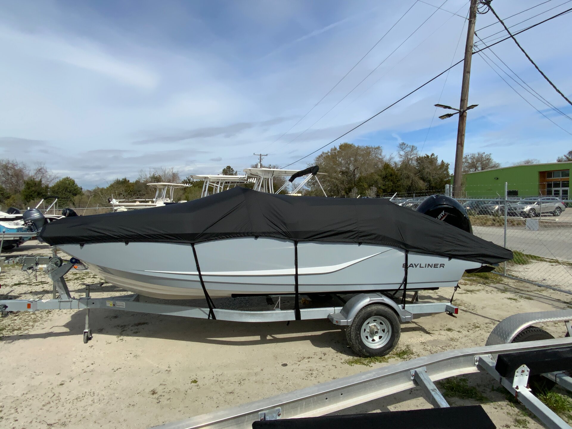 Custom-fit cover installed on Bayliner D20 Outboard