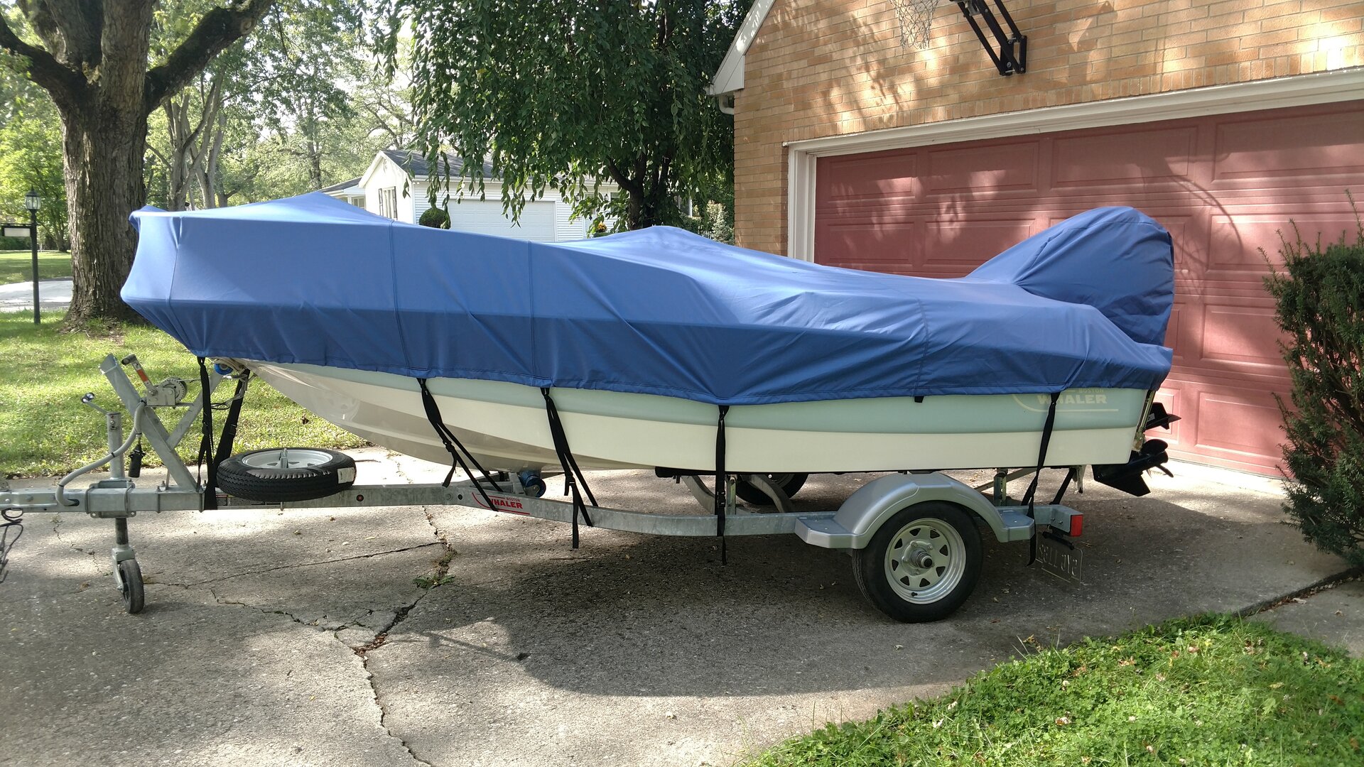 Custom-fit cover installed on Boston Whaler 13 Sport Outboard