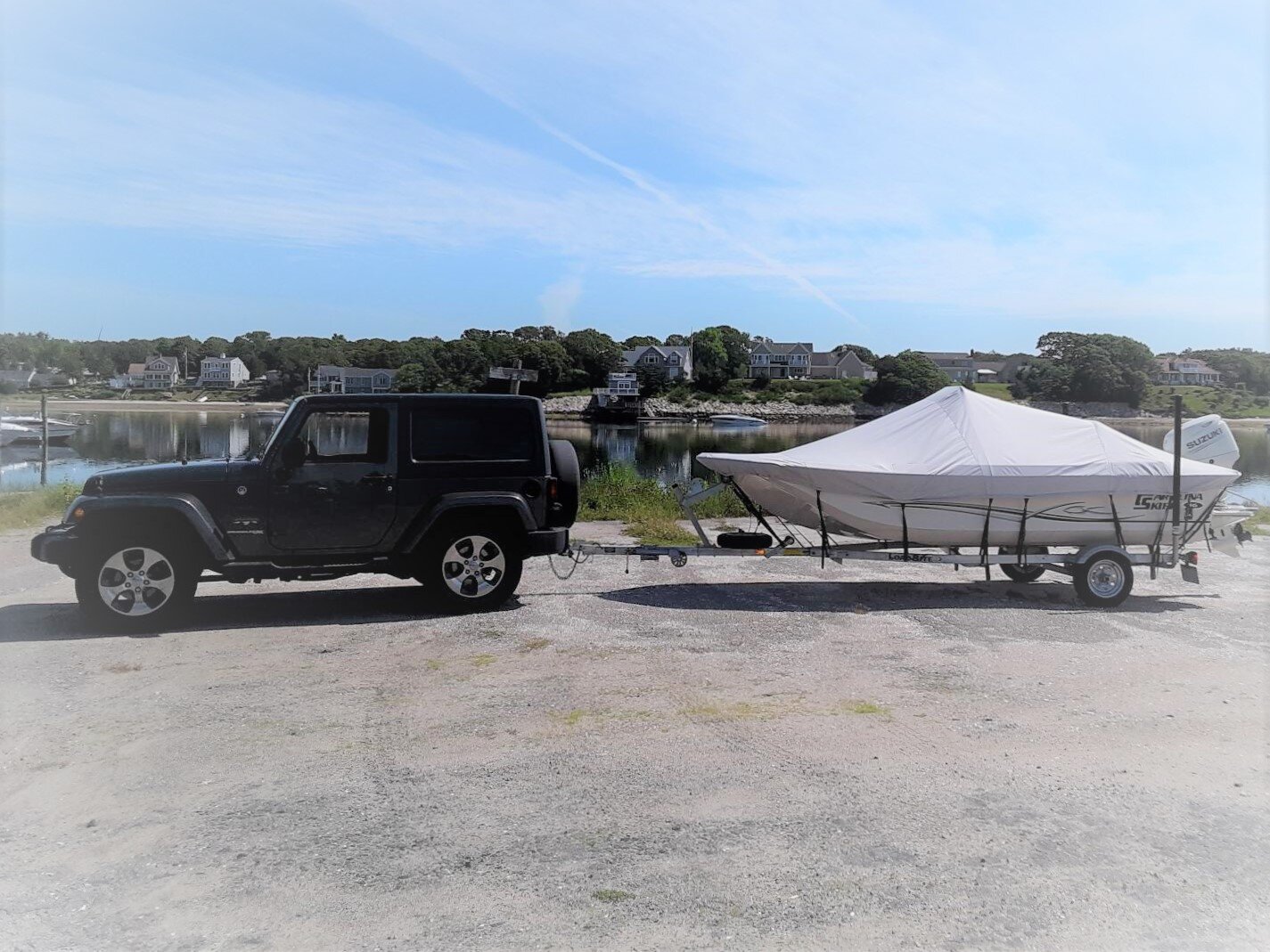 Custom-fit cover installed on Carolina Skiff JVX 16 CC Outboard