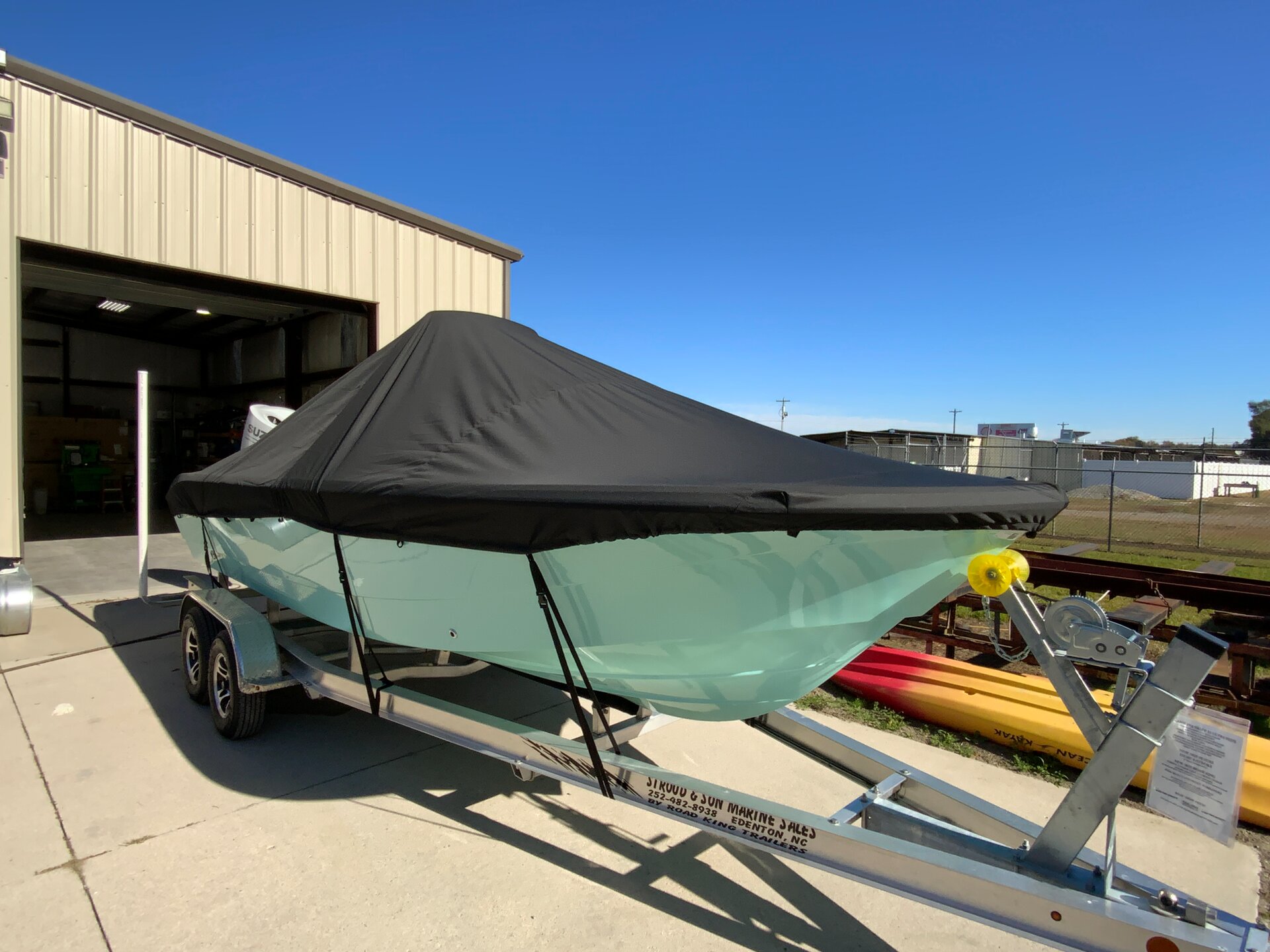 Custom-fit cover installed on Carolina Skiff Ultra Elite 22 CC Outboard