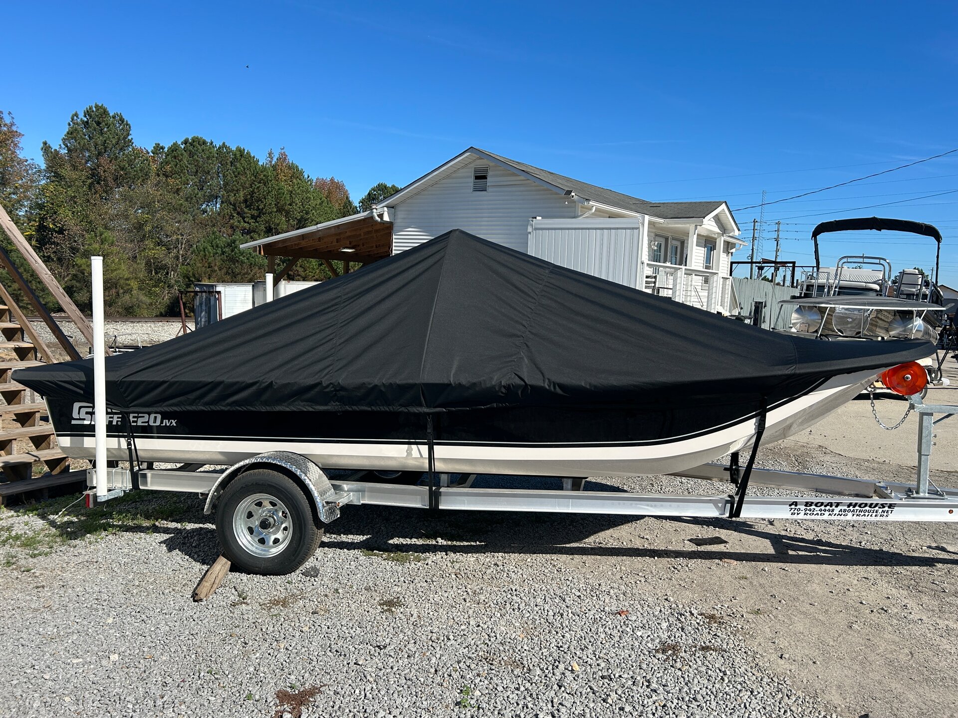 Custom-fit cover installed on Carolina Skiff E20 JVX CC Outboard