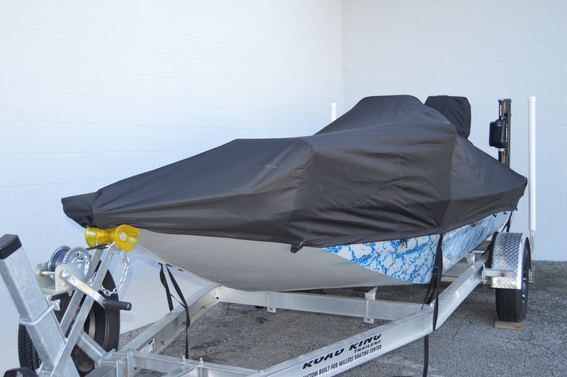 Custom-fit cover installed on Gator Tail Extreme 1860 CC Outboard