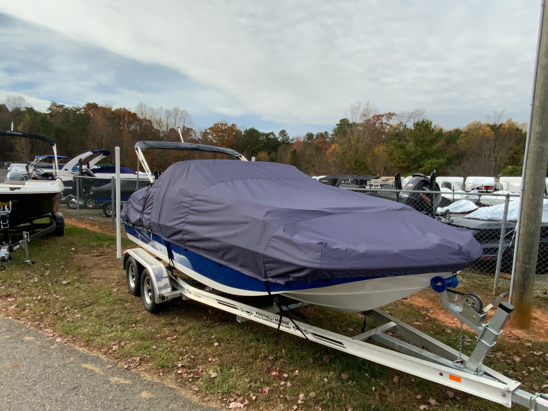 Custom-fit cover installed on Hurricane Sundeck SD 187 Outboard