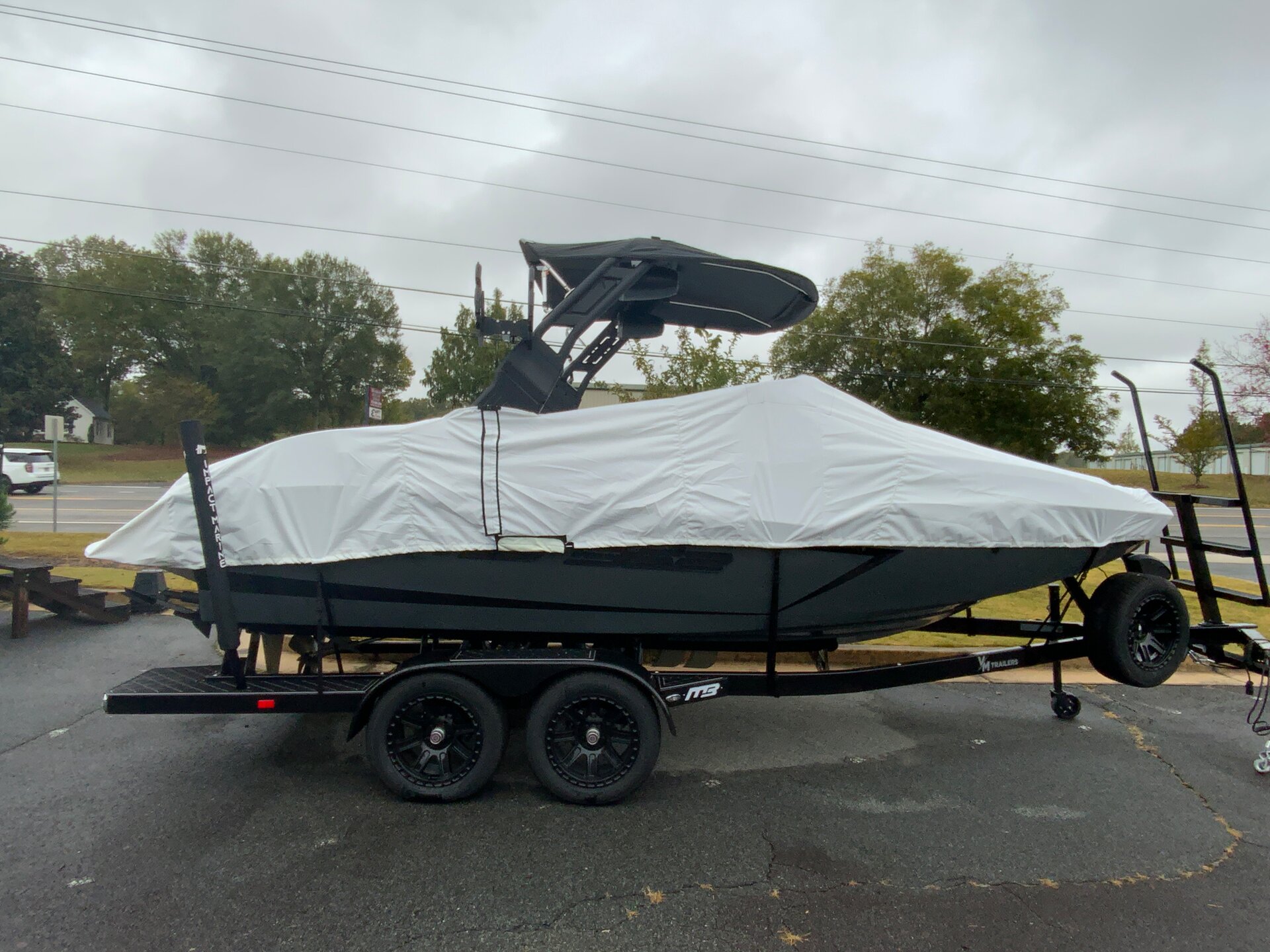 Custom-fit cover installed on MB Sports B52 Alpha 21 Inboard