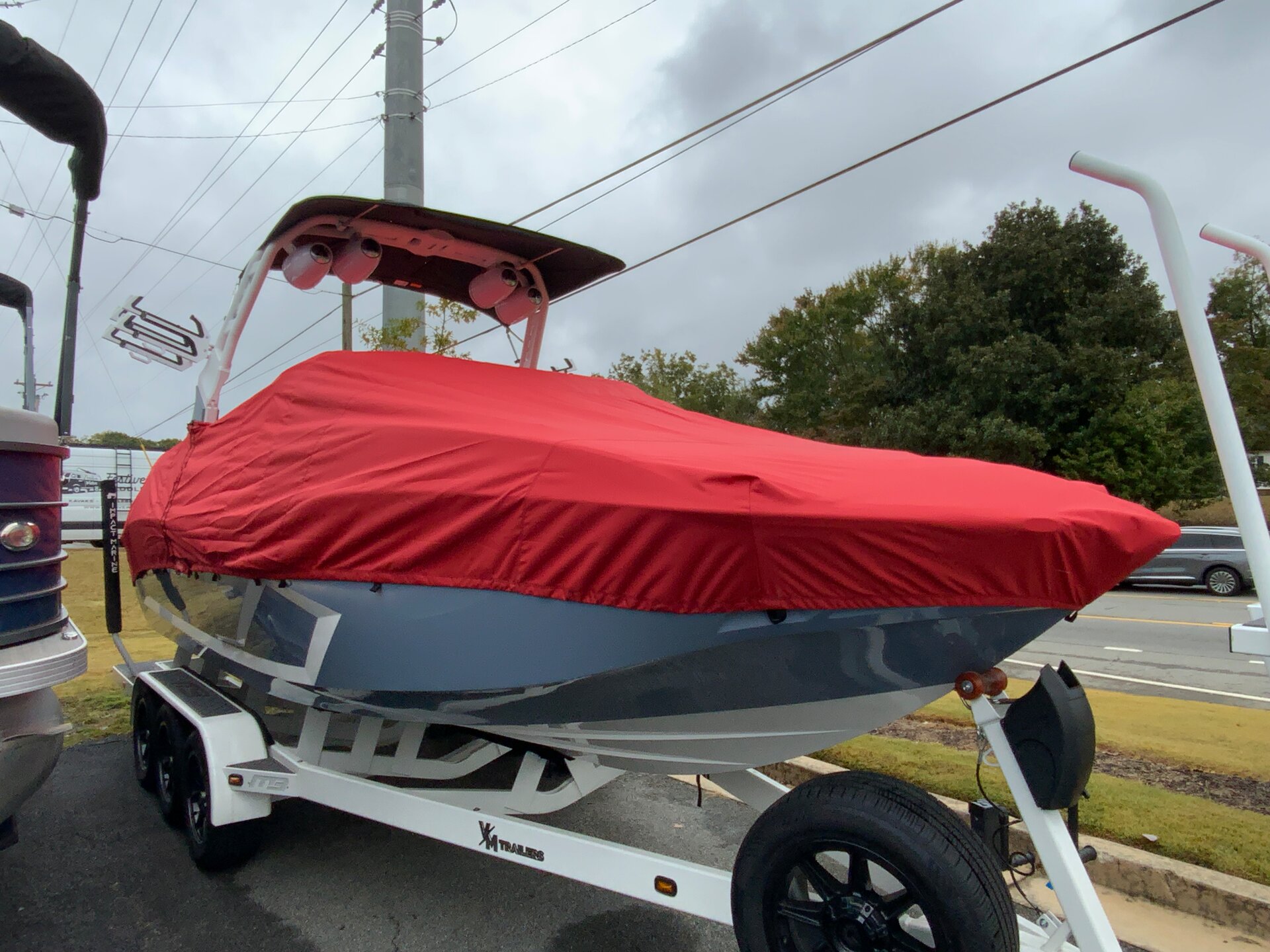 Custom-fit cover installed on MB Sports B52 Alpha 25 Inboard