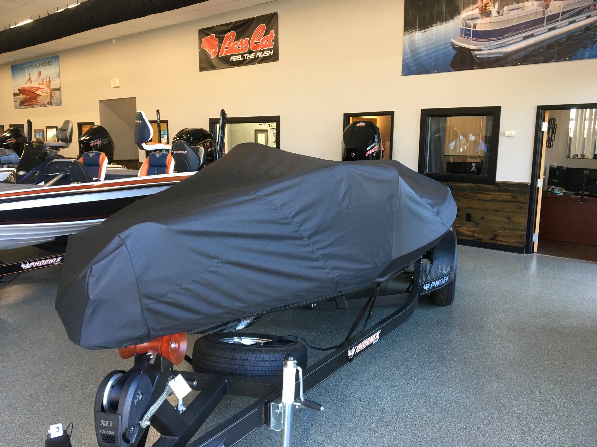 Custom-fit cover installed on Phoenix 818 Pro SC Outboard