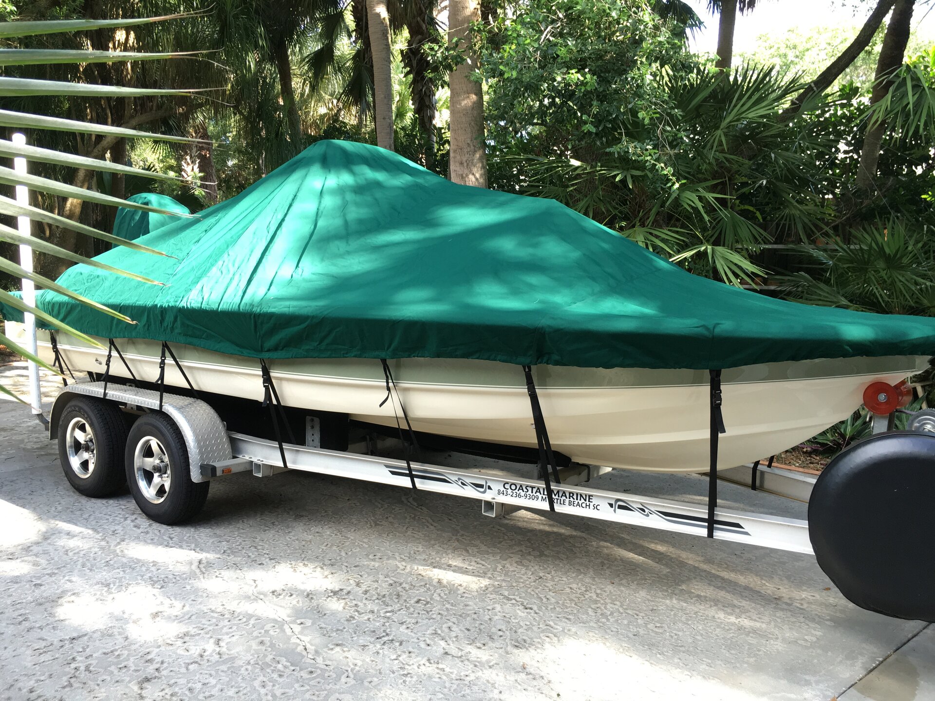 Custom-fit cover installed on Scout 201 Bay Outboard