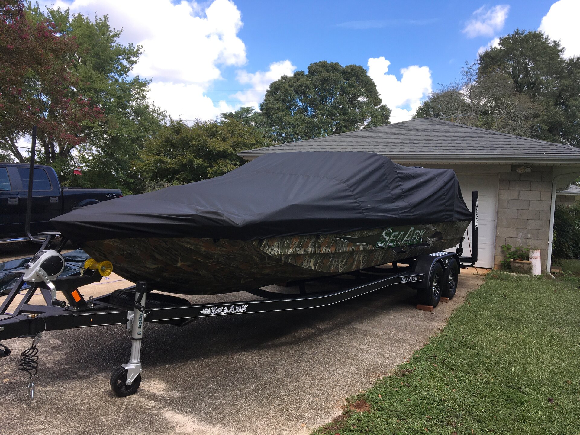 Custom-fit cover installed on Sea ARK Procat 240 Outboard