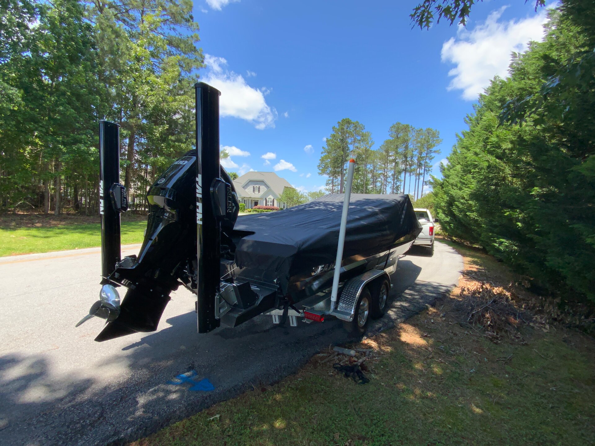 Custom-fit cover installed on Sea ARK Proguide 26 Outboard