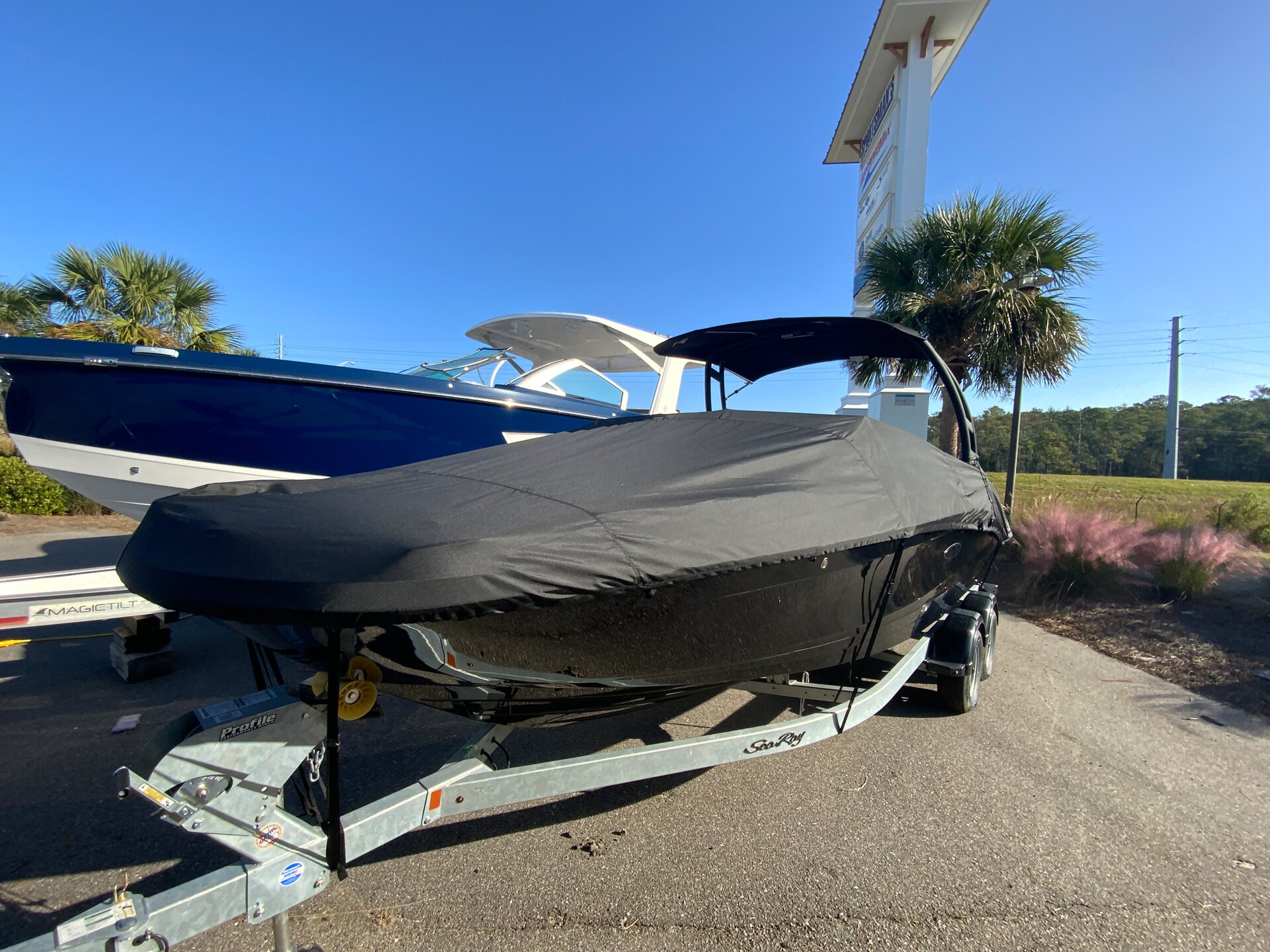 Custom-fit cover installed on Sea Ray 230 SPX Outboard