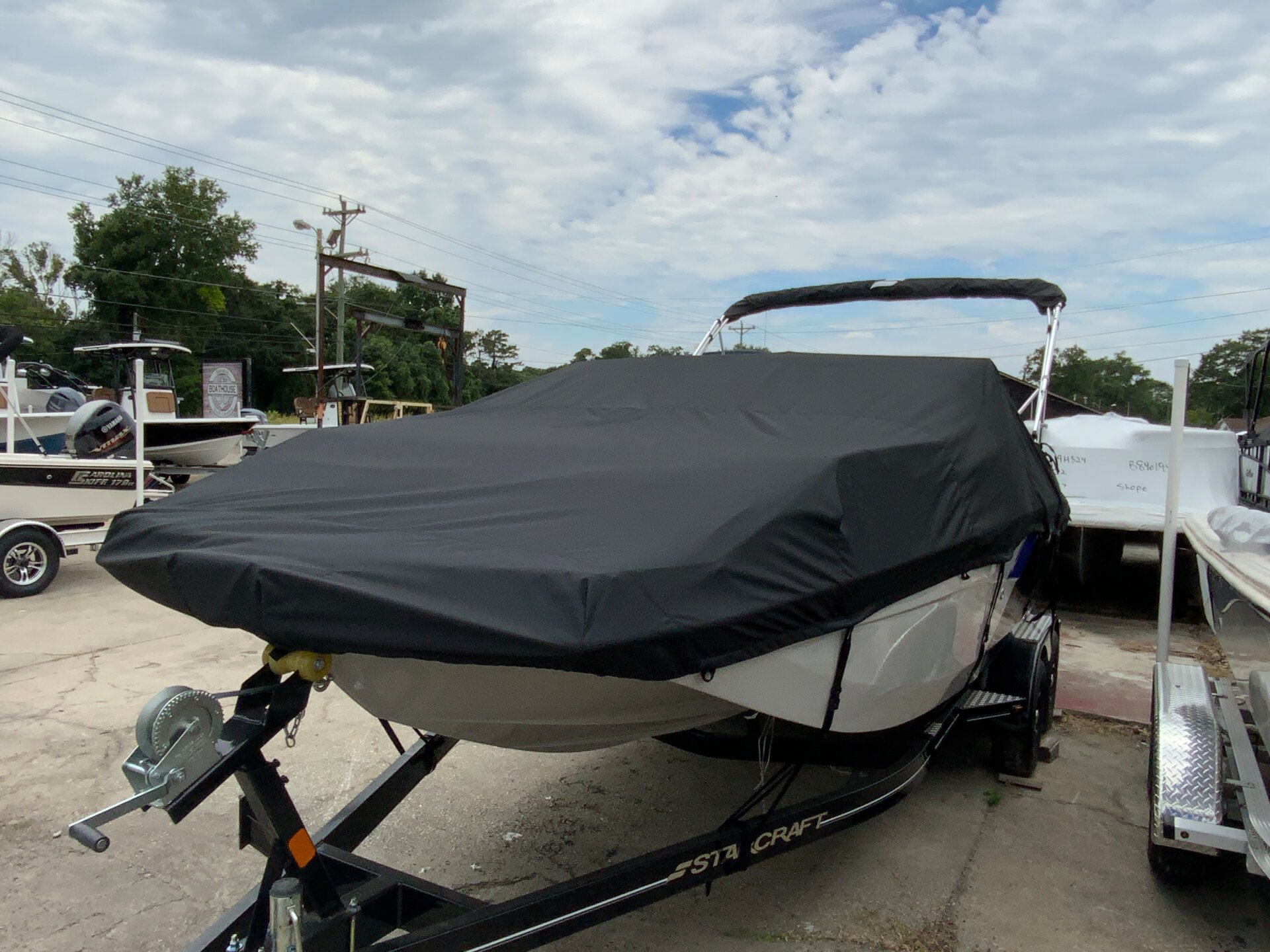 Custom-fit cover installed on Starcraft SVX 210 DC Outboard