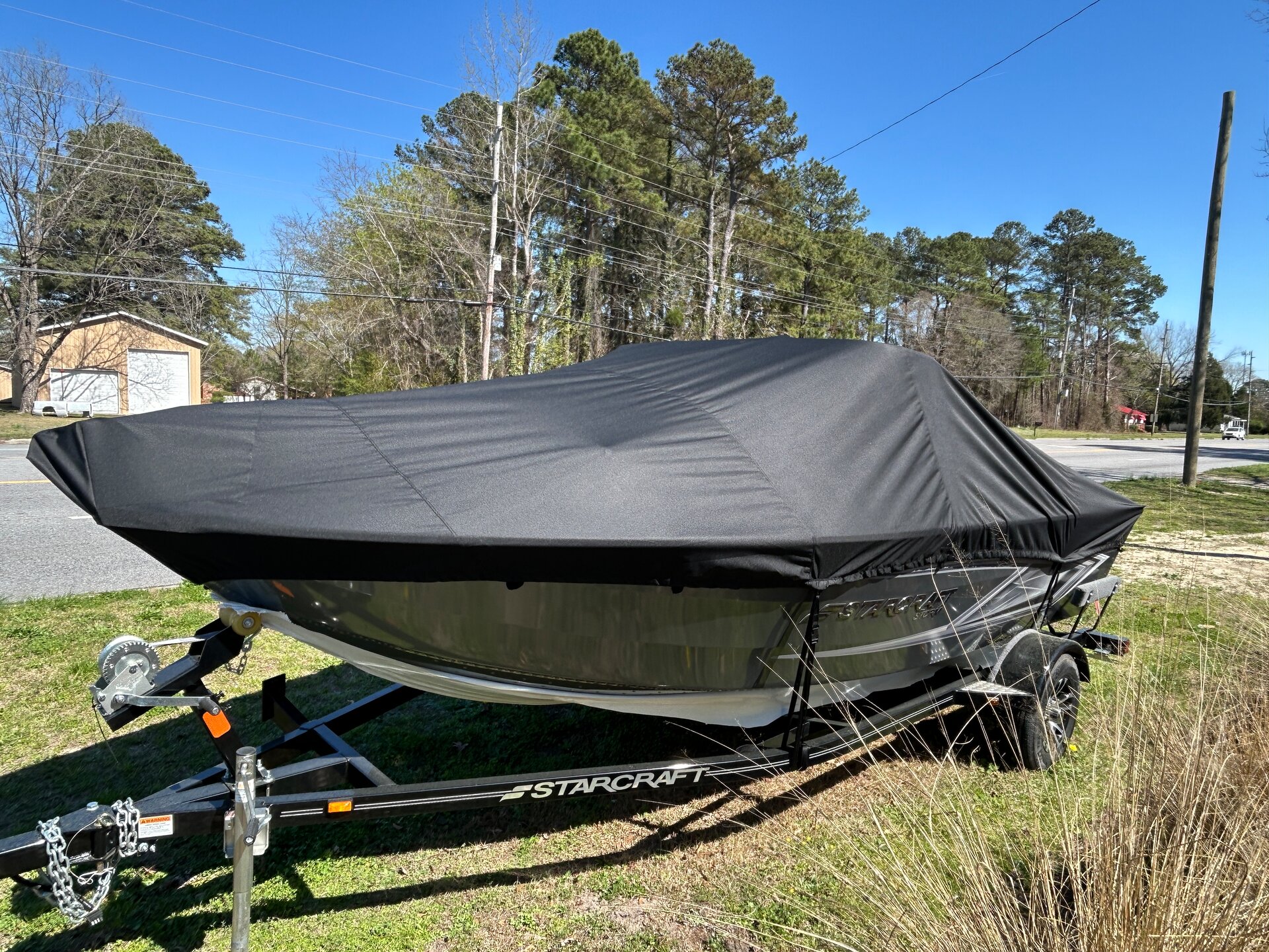 Custom-fit cover installed on Starcraft Storm 16 DC Pro Outboard