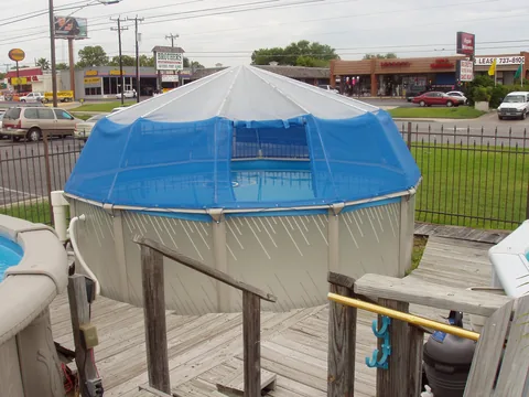Blue mesh sides and a vinyl roof on an installed Fabrico screen dome