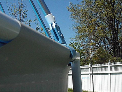 Close-up of the dome mounting bracket clamped to a soft-sided pool’s top rail