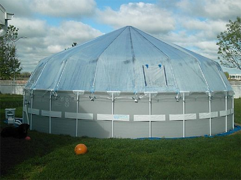 Front view of a vinyl Sun Dome on a round soft-sided pool