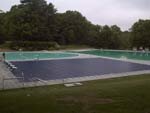 Blue Commercial Pool Cover On A Rectangular Lap Pool