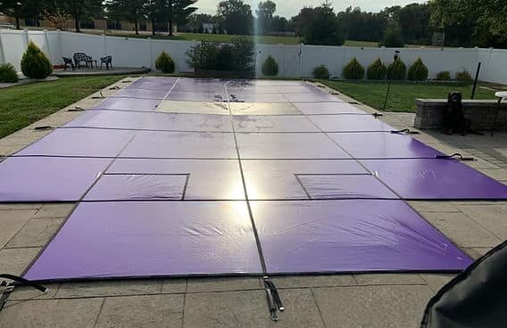 Purple Merlin Kaleidoscapes solid safety cover with a central drainage panel