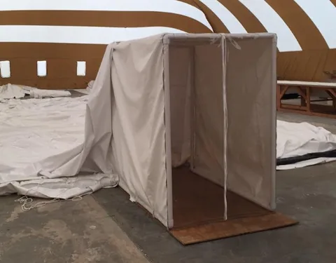 Attaching dome shroud to frame