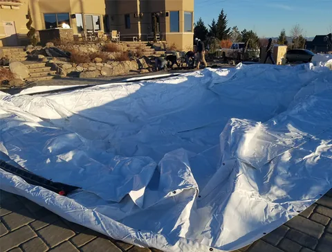 Dome fabric laid out over the work area