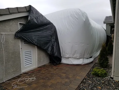 Airlock entry beside an existing building