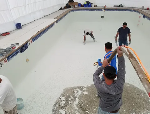Crew finishing the pool interior
