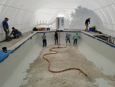 Crew and work hoses beneath the inflated dome