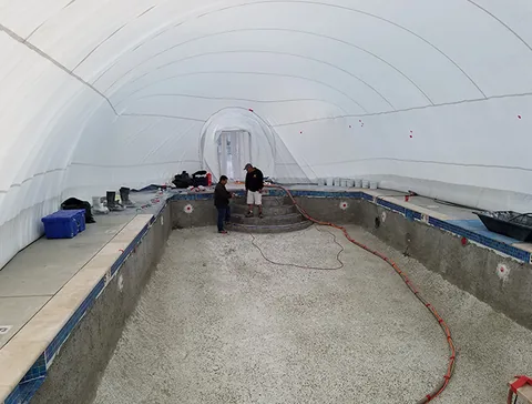 View along the pool toward the airlock entry