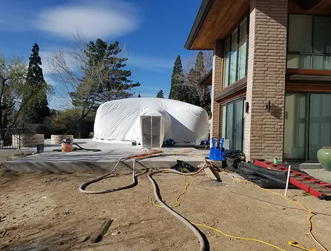 Construction dome beside a house during renovation