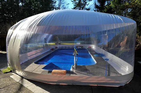 white residential pool dome end view