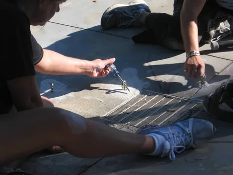 Screwing eye-bolts into the dome anchors