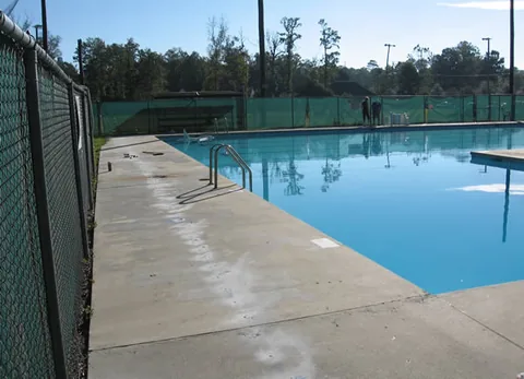Drilled holes in the pool deck