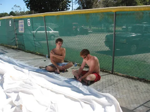 Cutting semi-circles out of the dome to attach it to the anchors