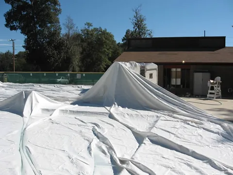 Dome laying over the water just before being inflated