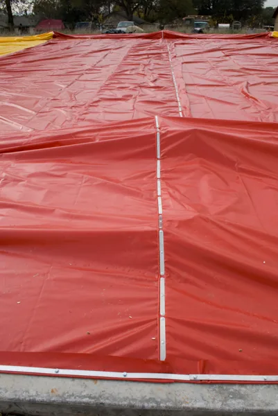 Aluminum fastening strips joining the red Sport Dome panels
