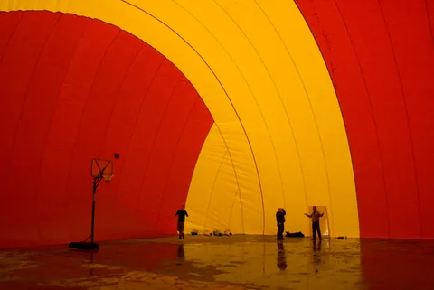 Basketball hoop standing inside the inflated Sport Dome