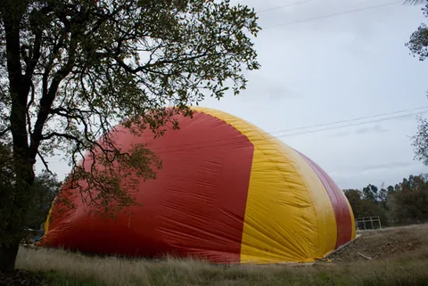 Red end wall and yellow side of the inflated Sport Dome