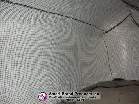 Side and end netting inside a white inflatable pitching dome