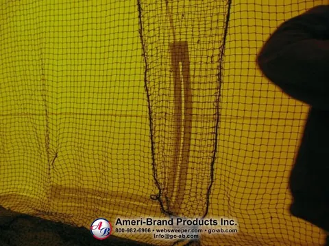 Close view of the overlapping net entry inside the pitching dome