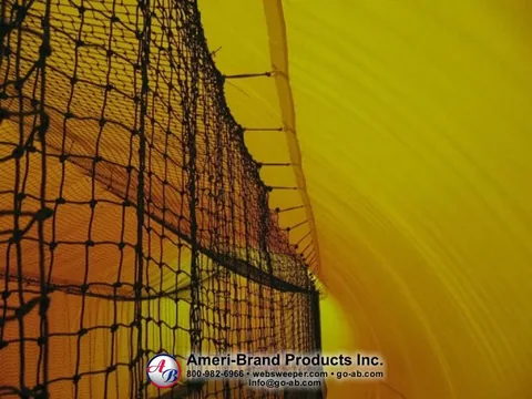 Batting net secured along the inflatable pitching dome wall