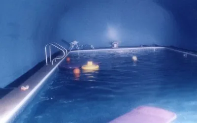 Swimming pool and deck inside an aqua Ameri-Dome