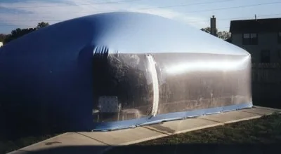 Aqua Ameri-Dome with a clear end wall over a backyard pool