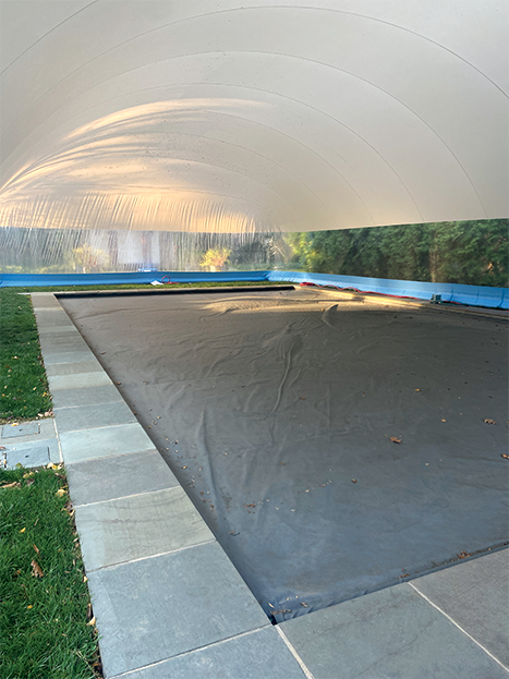 Clear water-tube dome covering a rectangular pool