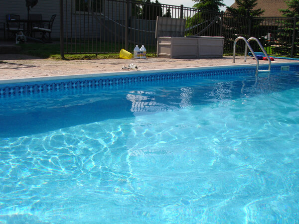 Ameri-Shield installed around an inground pool liner