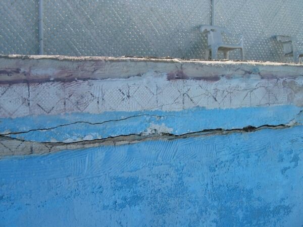 Crack due to winter-caused expansion.