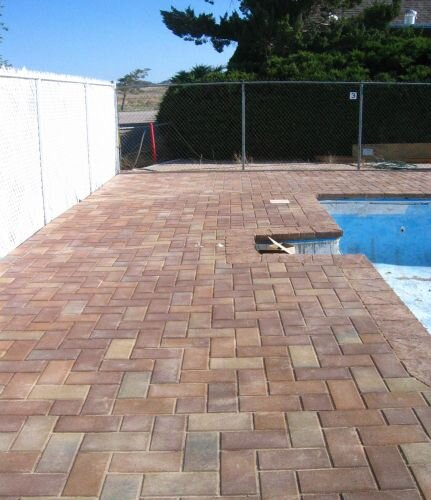 Deck is finished and looks good with pavers in place.